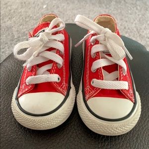 Red low top chuck taylors